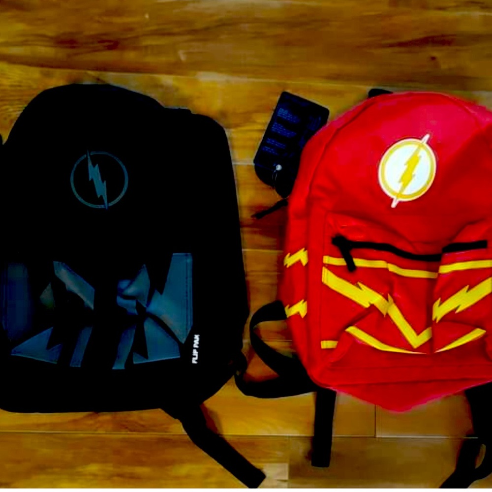 Nwt reversible flash bookbag. Exclusive form Spencer’s.